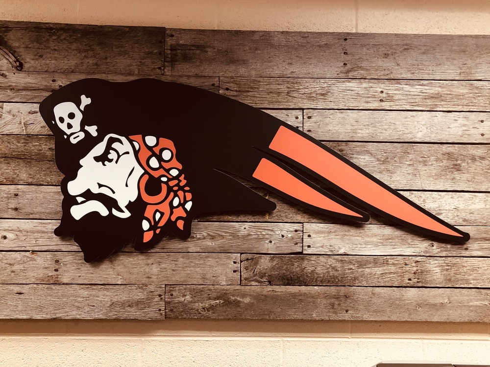 Vandal logo on wood wall