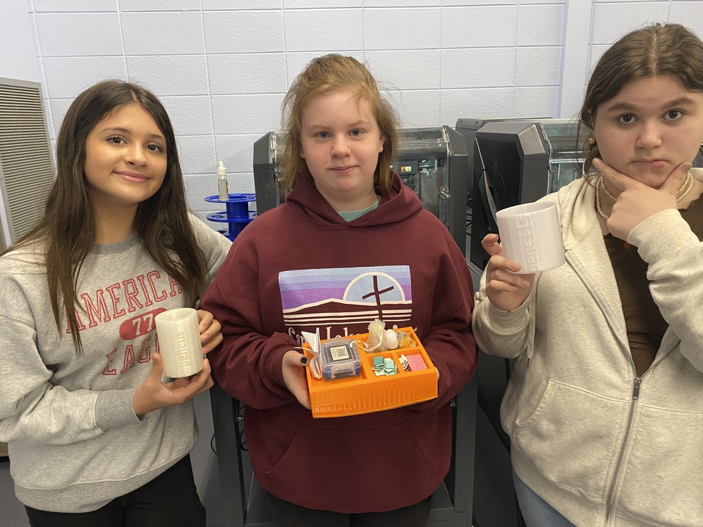 Students with 3-D Printed Projects